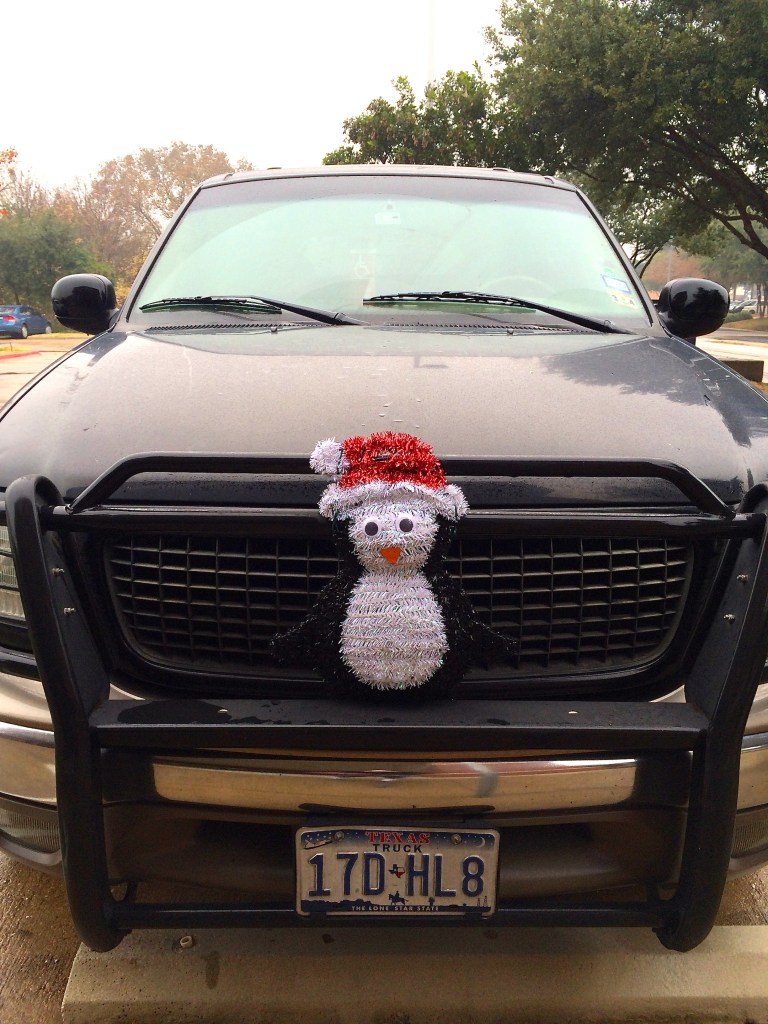 Santa Penguin got run over by a truck.